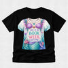 A black short-sleeve crewneck t-shirt featuring a colorful graphic of a mermaid costume with the text 'THIS IS MY BOOK WEEK COSTUME!' printed on the front.