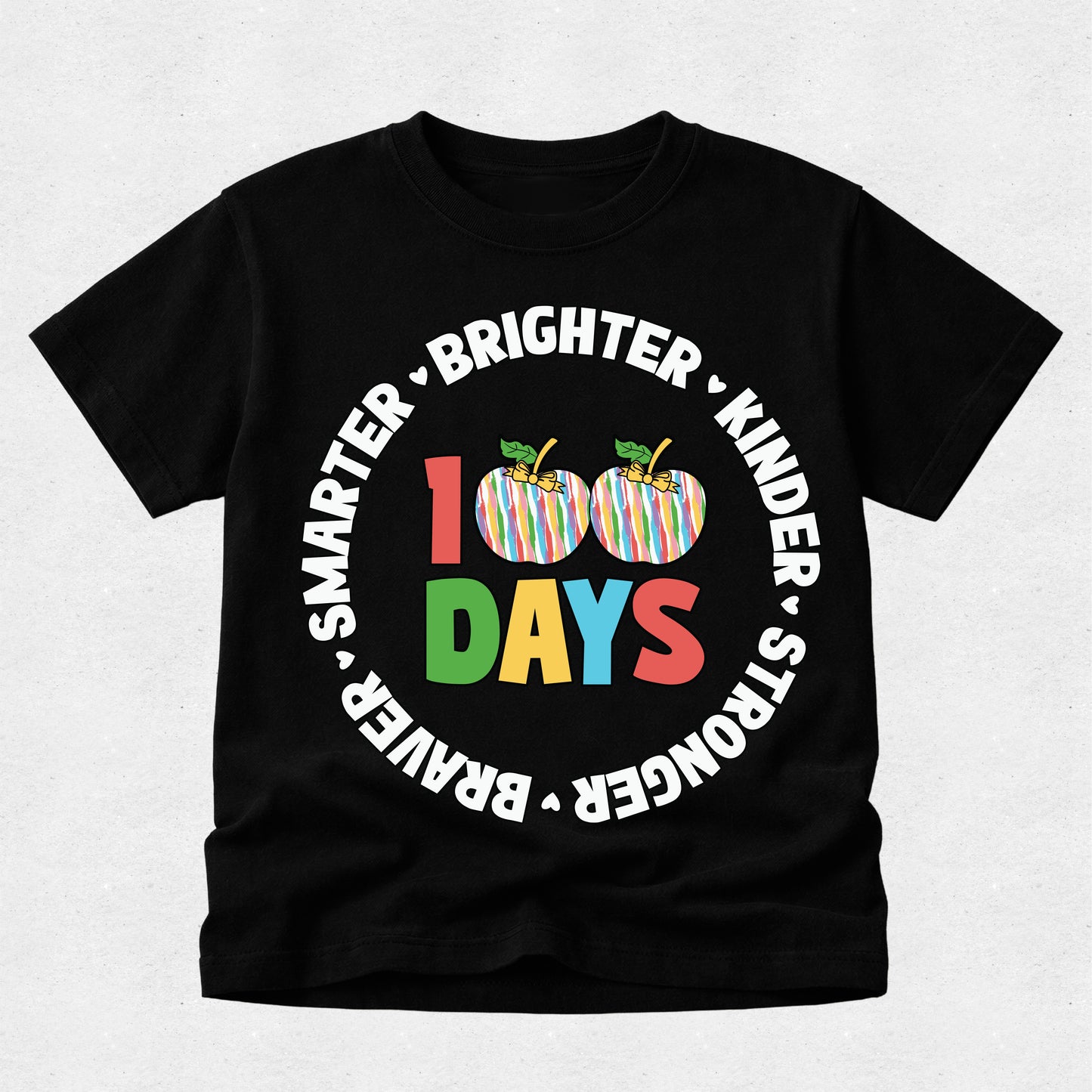 A black short-sleeve t-shirt with a colorful graphic celebrating 100 days. The design features two striped apples with green leaves, the number '100' in red and green, the word 'DAYS' in multicolor letters, and white text arched around them reading 'SMARTER • BRIGHTER • KINDER • STRONGER'.
