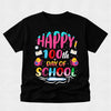 A black short-sleeve t-shirt with a colorful 'HAPPY 100th DAY OF SCHOOL' graphic print on the front, displayed against a light gray textured background.