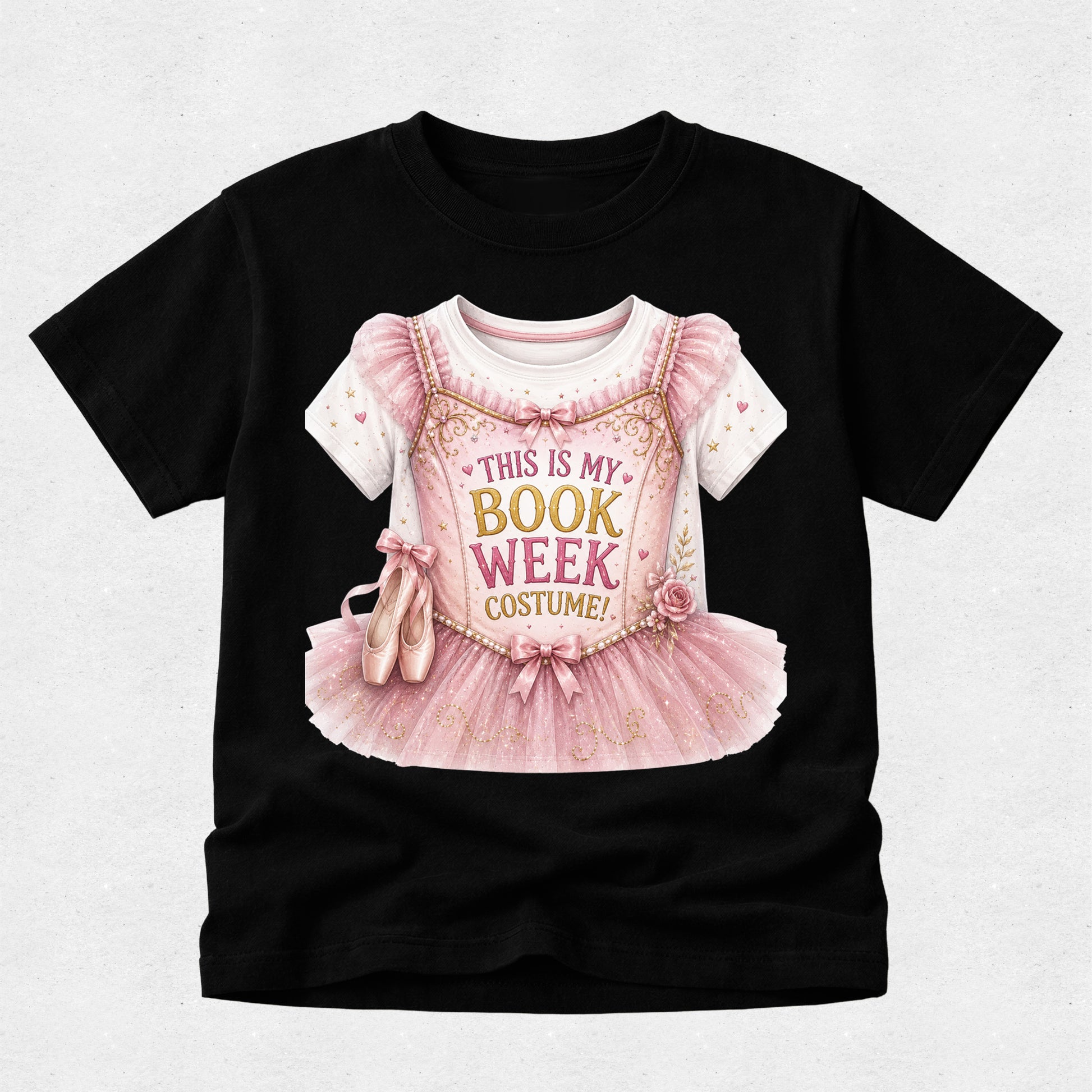 A black short-sleeve t-shirt with a graphic of a pink ballet costume and the text 'THIS IS MY BOOK WEEK COSTUME!' printed on the front, displayed against a light gray background.