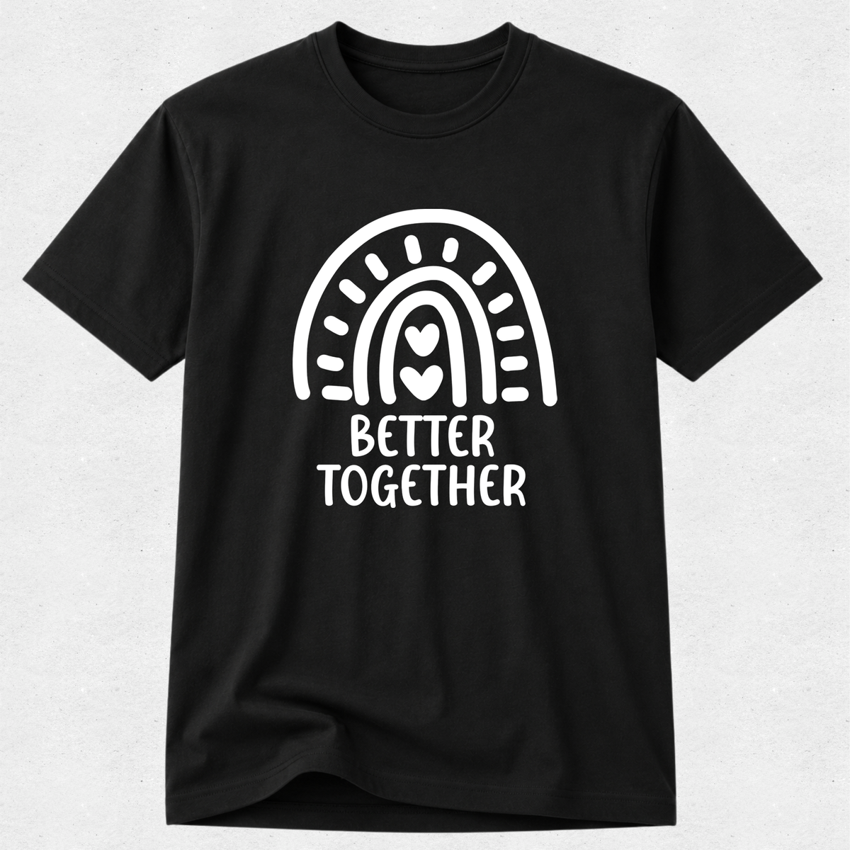 A black short-sleeve crewneck t-shirt with a white graphic of a stylized rainbow and the words 'BETTER TOGETHER' printed on the front, displayed against a light gray textured background.