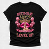 Black t-shirt with 'Birthday Queen' graphic design featuring balloons, a crown, and text on a light gray background.