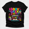 Black t-shirt with colorful 'Book Week Energy Symphony of Stories' design on a light gray background