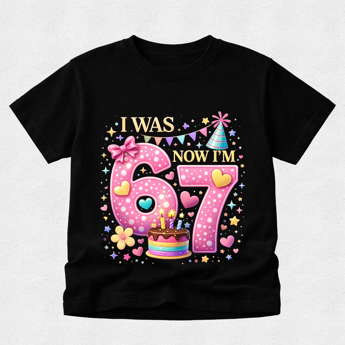 Black t-shirt with a colorful birthday design on a light gray background