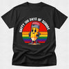 Black t-shirt with a colorful pencil graphic and 'Happy 100 Days of School' text on a light gray background