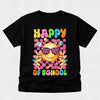 A black short-sleeve t-shirt with a colorful retro graphic that reads 'HAPPY 100 DAYS OF SCHOOL' featuring a smiling yellow face, pink checkerboard pattern, and school-themed icons like pencils, flowers, and lightning bolts.