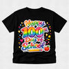 A black short-sleeve t-shirt with a colorful 'Happy 100th Day of School' graphic on the front, featuring a rainbow gradient, stars, hearts, a pencil, and an apple, displayed against a light gray background.