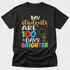 Black t-shirt with colorful text and light bulb graphic on a white background
