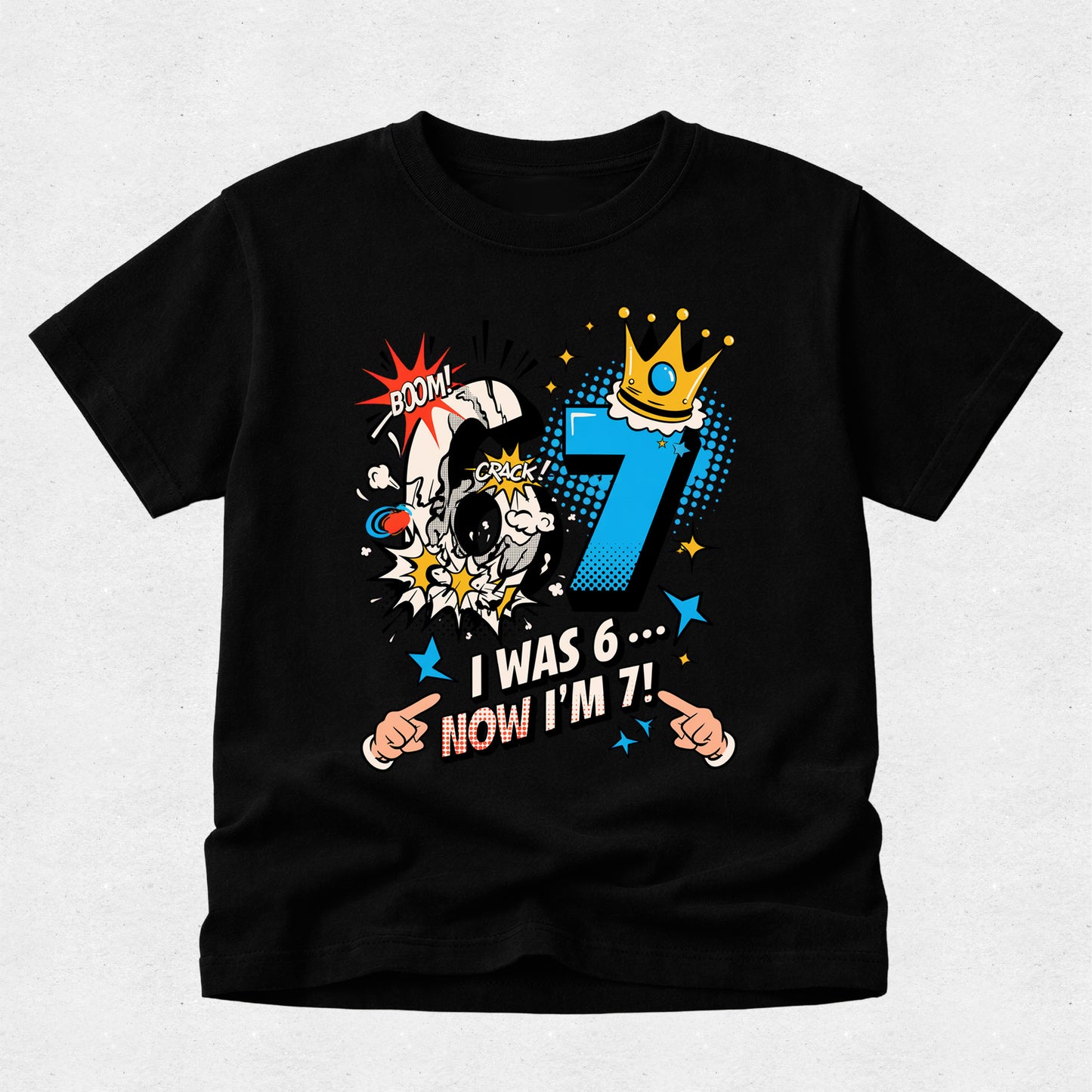 Black personalised 7th birthday t-shirt with comic-style "I Was 6... Now I'm 7!" design for boys.