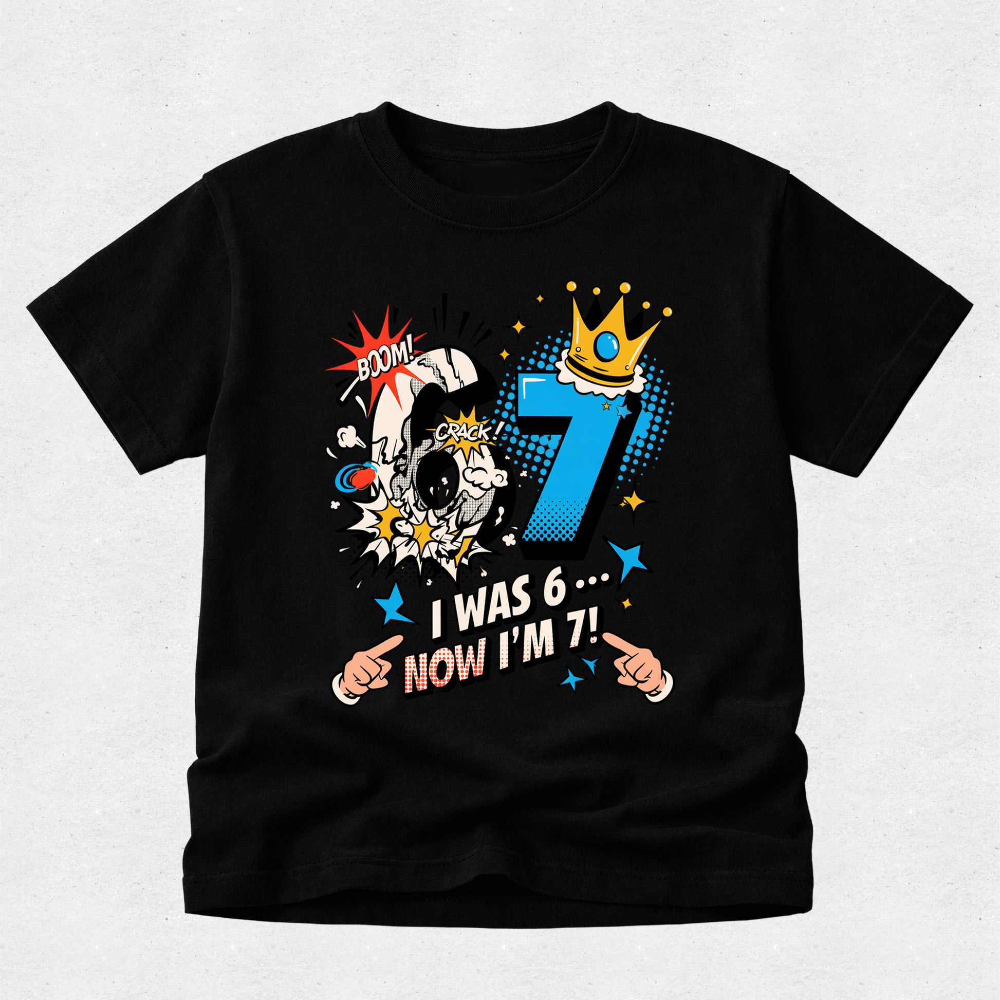 Black personalised 7th birthday t-shirt with comic-style "I Was 6... Now I'm 7!" design for boys.