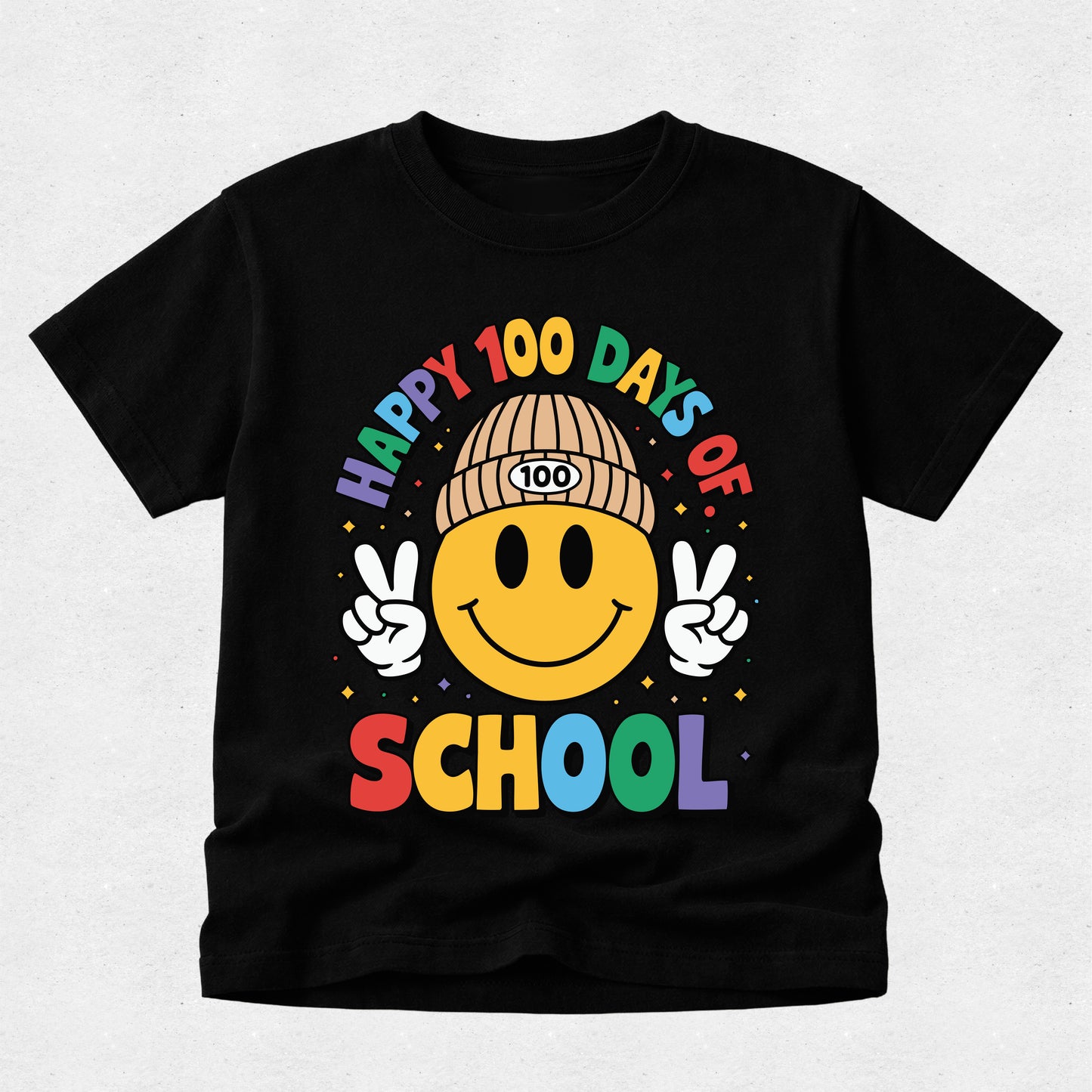 A black short-sleeve t-shirt with a colorful graphic on the front. The graphic features a yellow smiley face wearing a tan beanie with '100' on it, making peace signs with both hands, surrounded by the text 'HAPPY 100 DAYS OF SCHOOL' in rainbow colors.