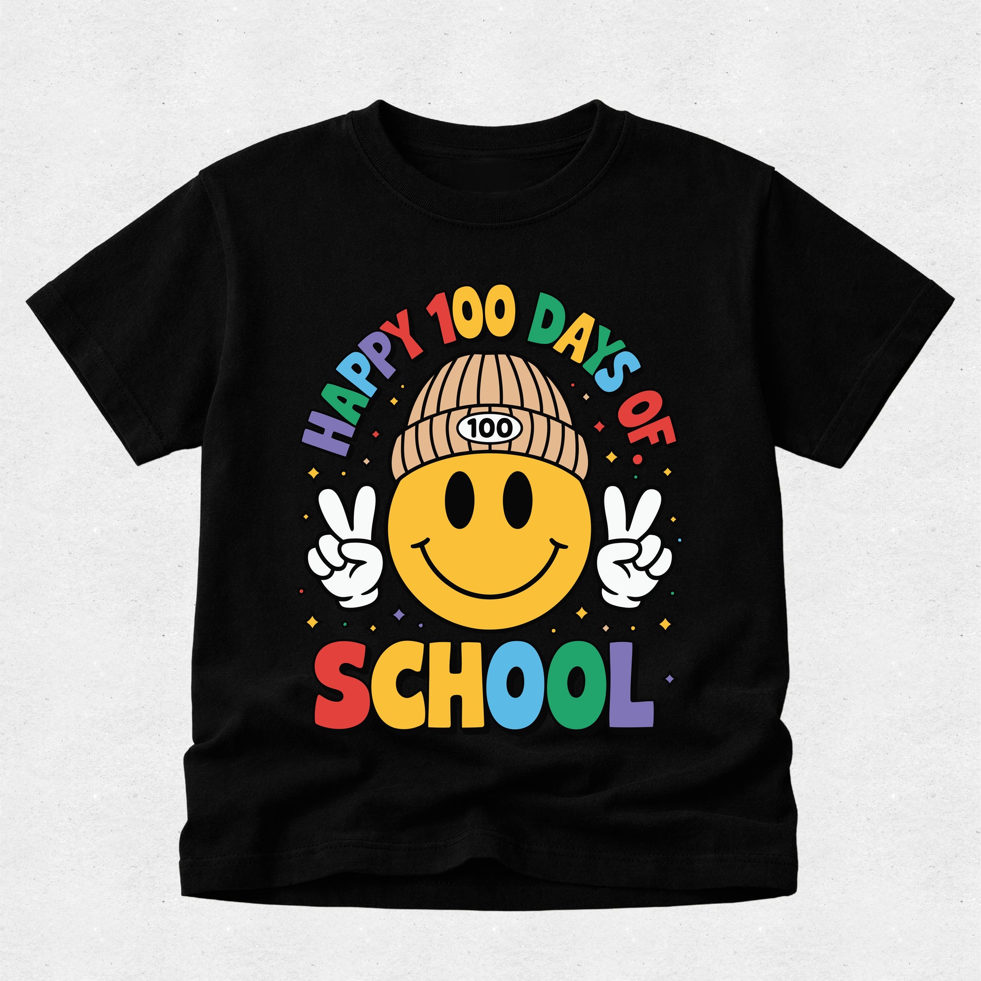 A black short-sleeve t-shirt with a colorful graphic on the front. The graphic features a yellow smiley face wearing a tan beanie with '100' on it, making peace signs with both hands, surrounded by the text 'HAPPY 100 DAYS OF SCHOOL' in rainbow colors.
