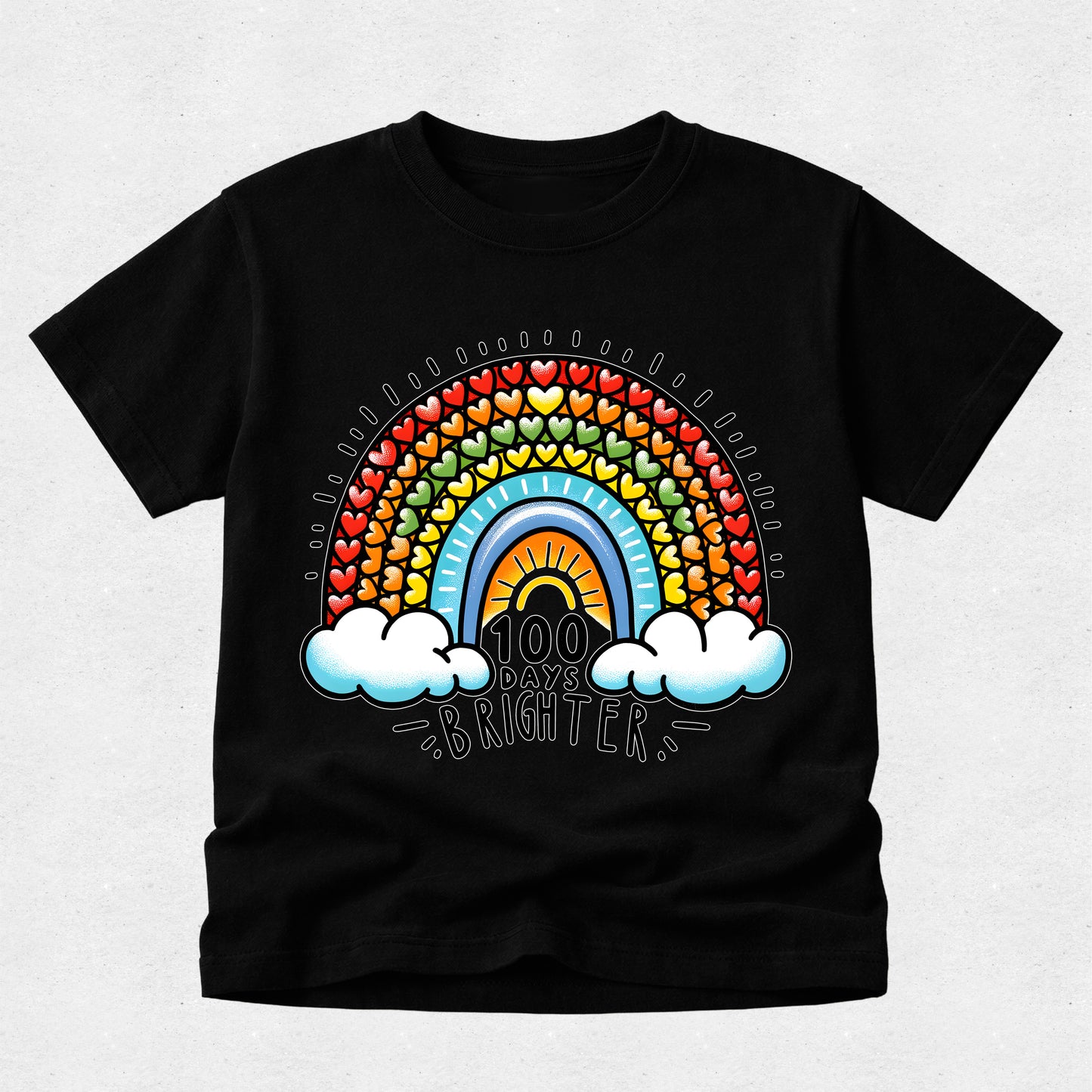 A black short-sleeve crewneck t-shirt featuring a colorful retro rainbow graphic on the front. The graphic includes a rainbow arch made of small hearts, a yellow sun, two white clouds, and the text '100 DAYS BRIGHTER' in a stylized font.