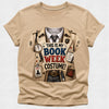 A beige short-sleeve crewneck t-shirt featuring a graphic print of a detective book club costume vest with accessories and the text 'THIS IS MY BOOK WEEK COSTUME!'.