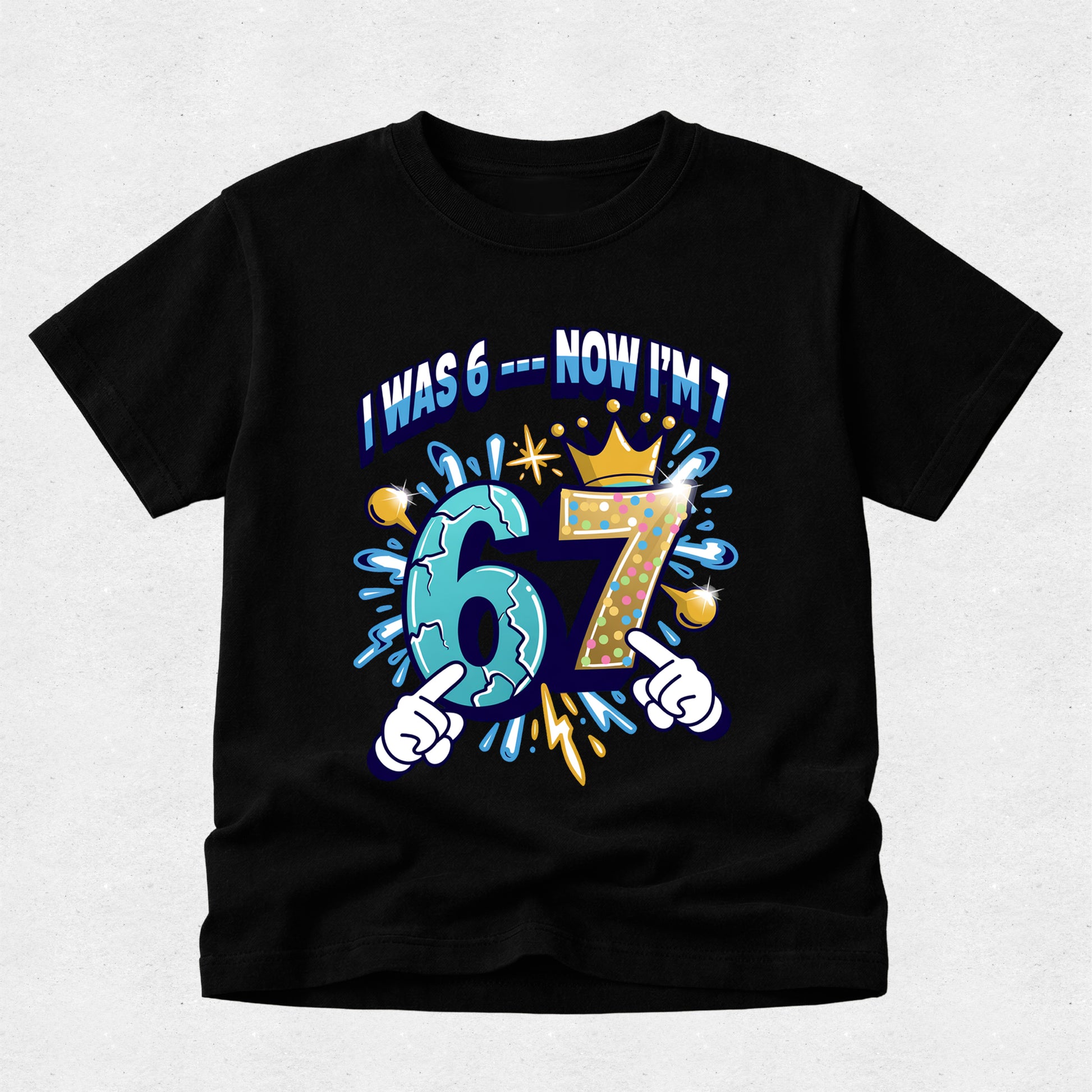 Black boys 7th birthday t-shirt with colourful cartoon number design reading "I Was 6 Now I'm 7".