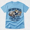 Light blue t-shirt with New South Wales State of Origin design featuring a cockatoo and shark.