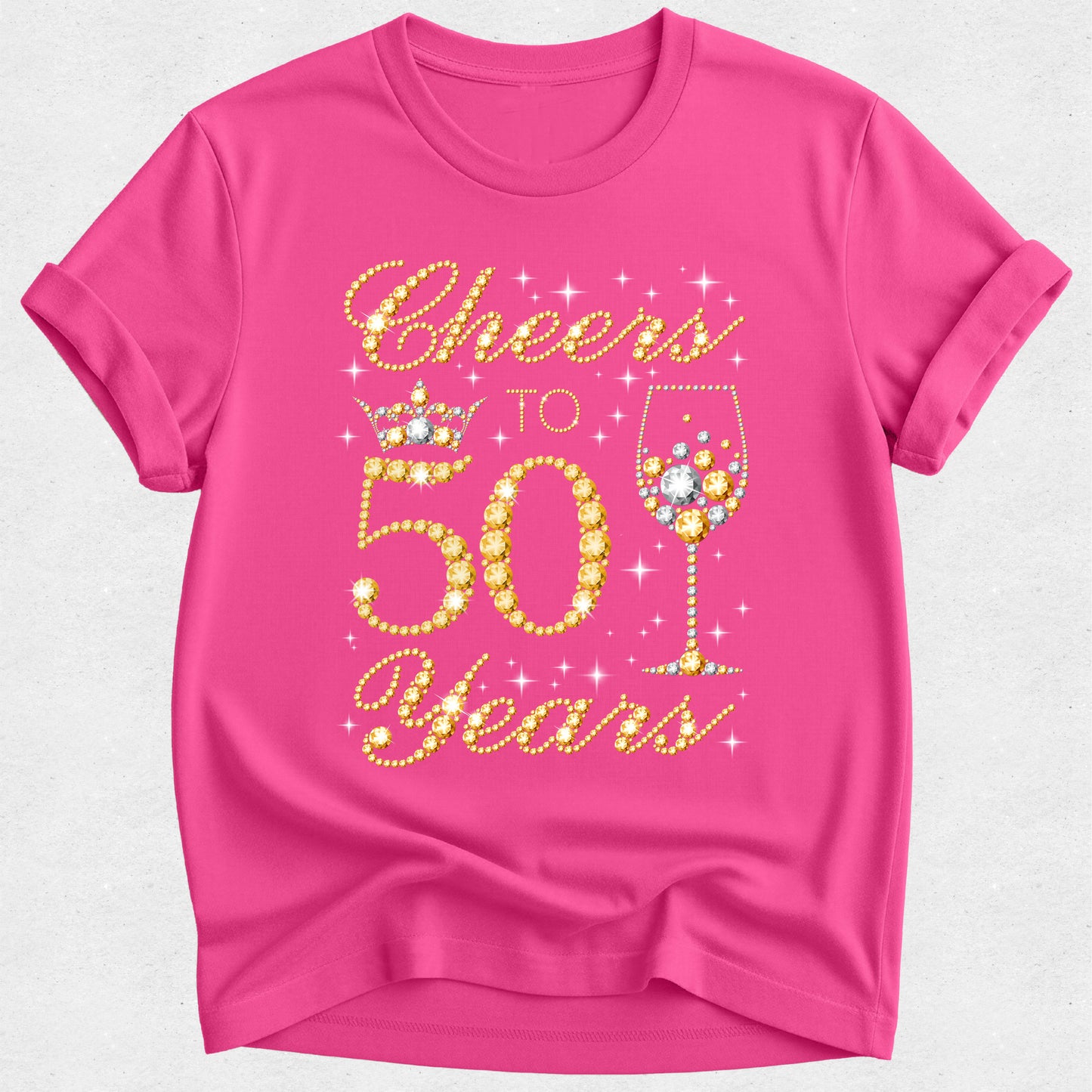 Pink t-shirt with 'Cheers to 50 Years' text and wine glass design on a white background