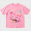 Pink t-shirt with birthday-themed design on a light gray background