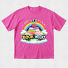 A bright pink short-sleeve t-shirt with a colorful cartoon graphic on the front that reads 'IT'S BOOK WEEK!' under a rainbow and stack of books.