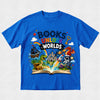 A bright blue short-sleeve t-shirt with a colorful graphic print on the front. The graphic features the text 'BOOKS UNLOCK WORLDS' above an open book with various whimsical illustrations including a castle, rainbow, dinosaur, rocket ship, dragon, and treasure chest, all set against a light gray textured background.