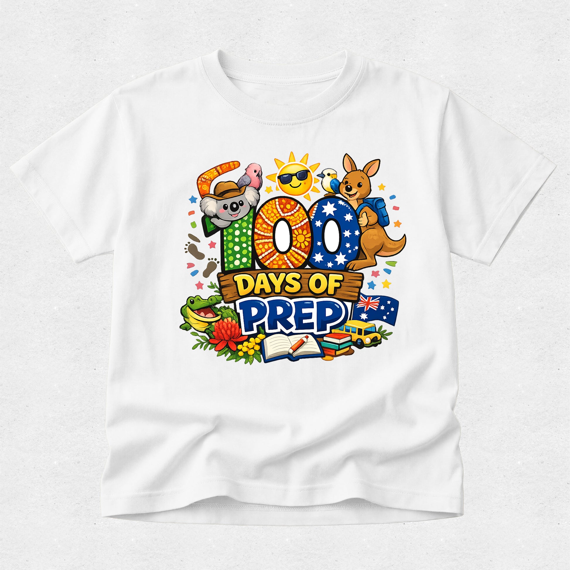 White t-shirt with colorful '100 Days of Prep' design featuring cartoon characters and icons.