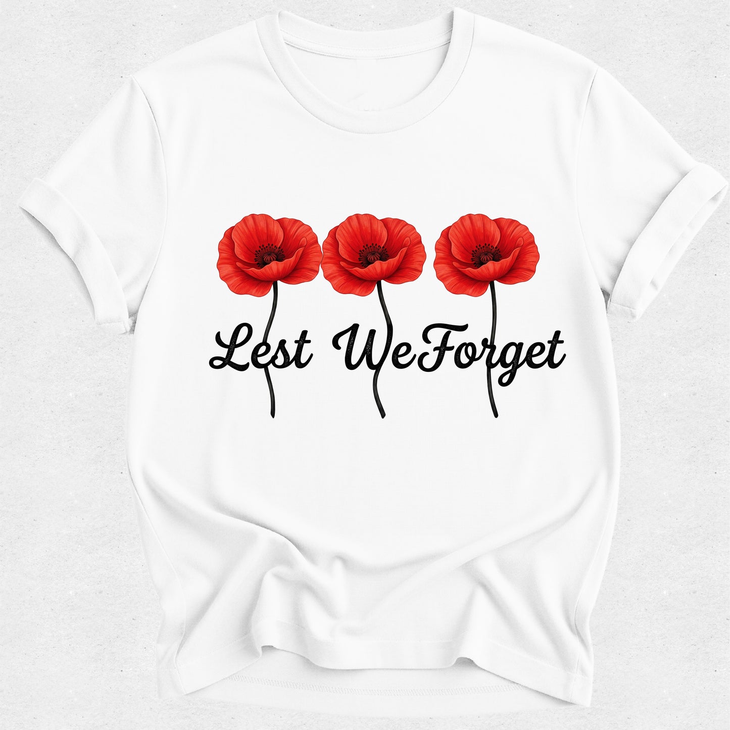 White t-shirt with red poppies and 'Lest We Forget' text on a white background