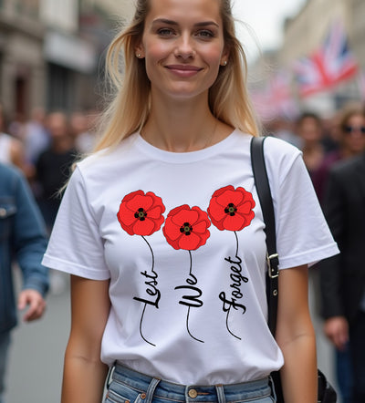 Woman wearing a white t-shirt with red poppy flowers and text in a busy street.