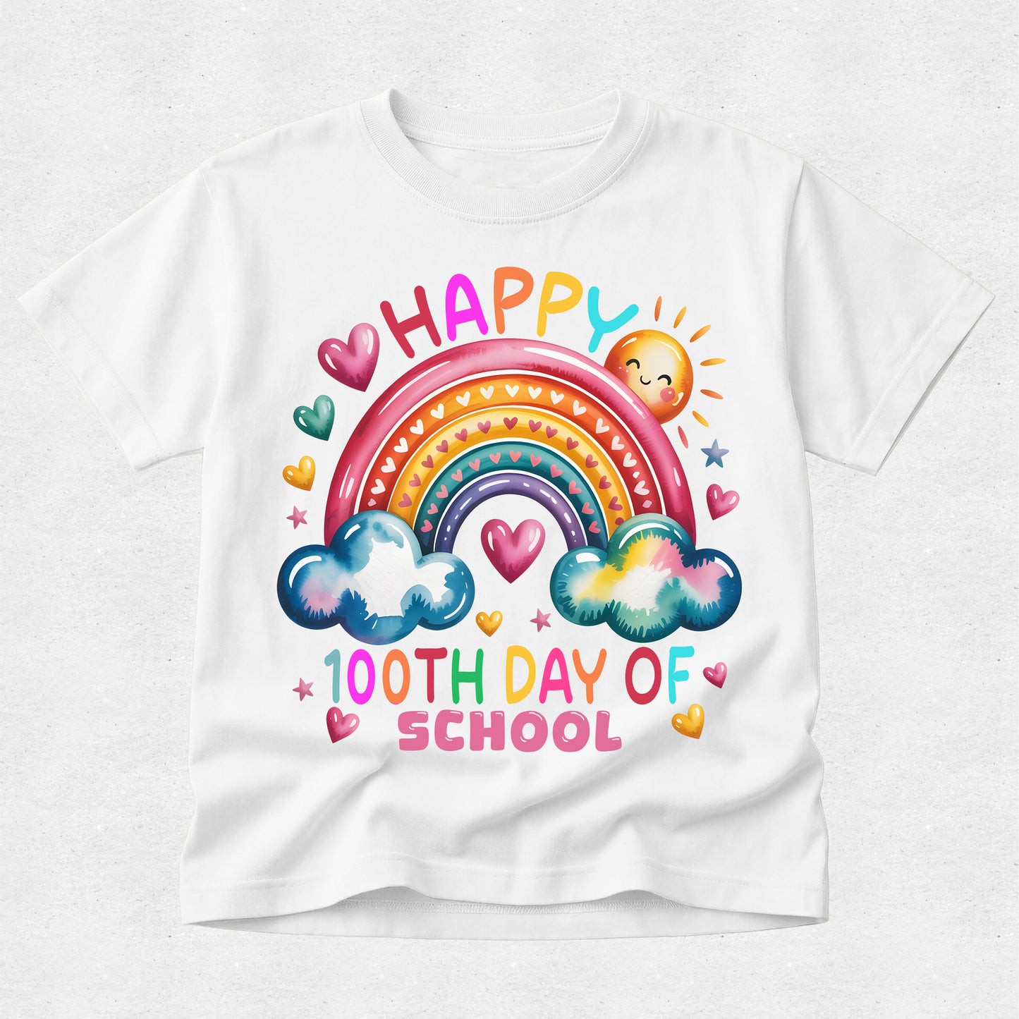 A white short-sleeve t-shirt with a colorful graphic on the front that reads 'HAPPY 100TH DAY OF PREP' under a rainbow, clouds, hearts, and a smiling sun.