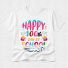 A white short-sleeve crewneck t-shirt featuring a colorful graphic design that reads 'HAPPY 100th DAY OF SCHOOL' in playful pink, blue, red, and yellow lettering, decorated with school-themed illustrations like backpacks, books, and a pencil.