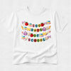 A white short-sleeve crewneck t-shirt featuring a colorful graphic on the front that reads '1000 DAYS OF SCHOOL' in pastel lettering, decorated with school-themed illustrations like apples, books, and pencils.