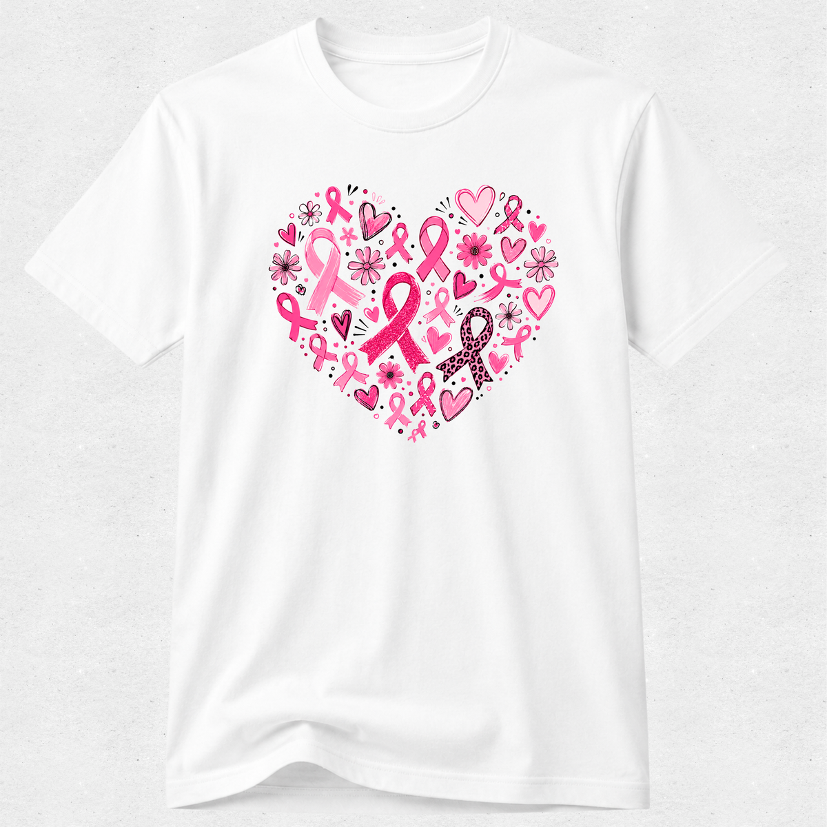white breast cancer awareness T-shirt with a heart design made of pink ribbons, flowers and hearts.