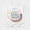 A white short-sleeve crewneck t-shirt featuring a colorful graphic design on the front. The design reads '100 DAYS OF SCHOOL' in a playful black-and-white font, surrounded by 'HAPPY' written in multiple colors (yellow, orange, pink, blue) in an arc, with a cute rainbow pencil illustration at the bottom.