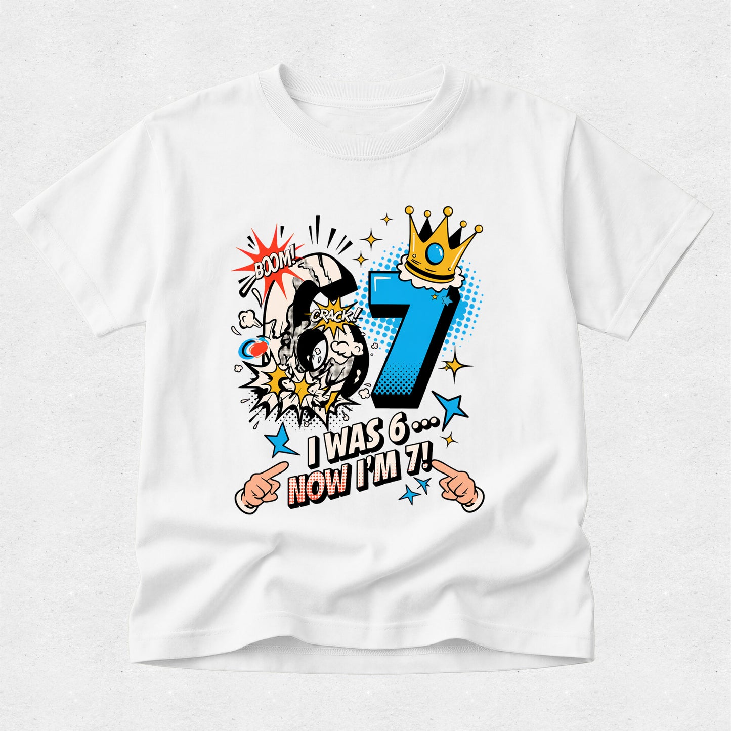 White personalised 7th birthday t-shirt with comic-style "I Was 6... Now I'm 7!" birthday graphic.