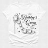 White t-shirt with 'Birthday Queen' text and decorative elements on a white background