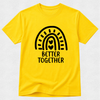 A bright yellow short-sleeve t-shirt with a black graphic of a rainbow arching over the words 'BETTER TOGETHER' in a rounded block font. The t-shirt is displayed flat against a light gray textured background.