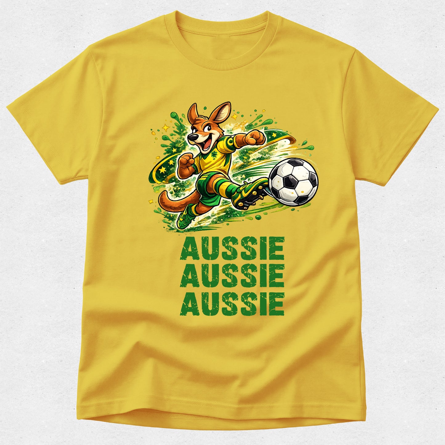 Yellow t-shirt with a kangaroo kicking a soccer ball and 'Aussie Aussie Aussie' text on a white background