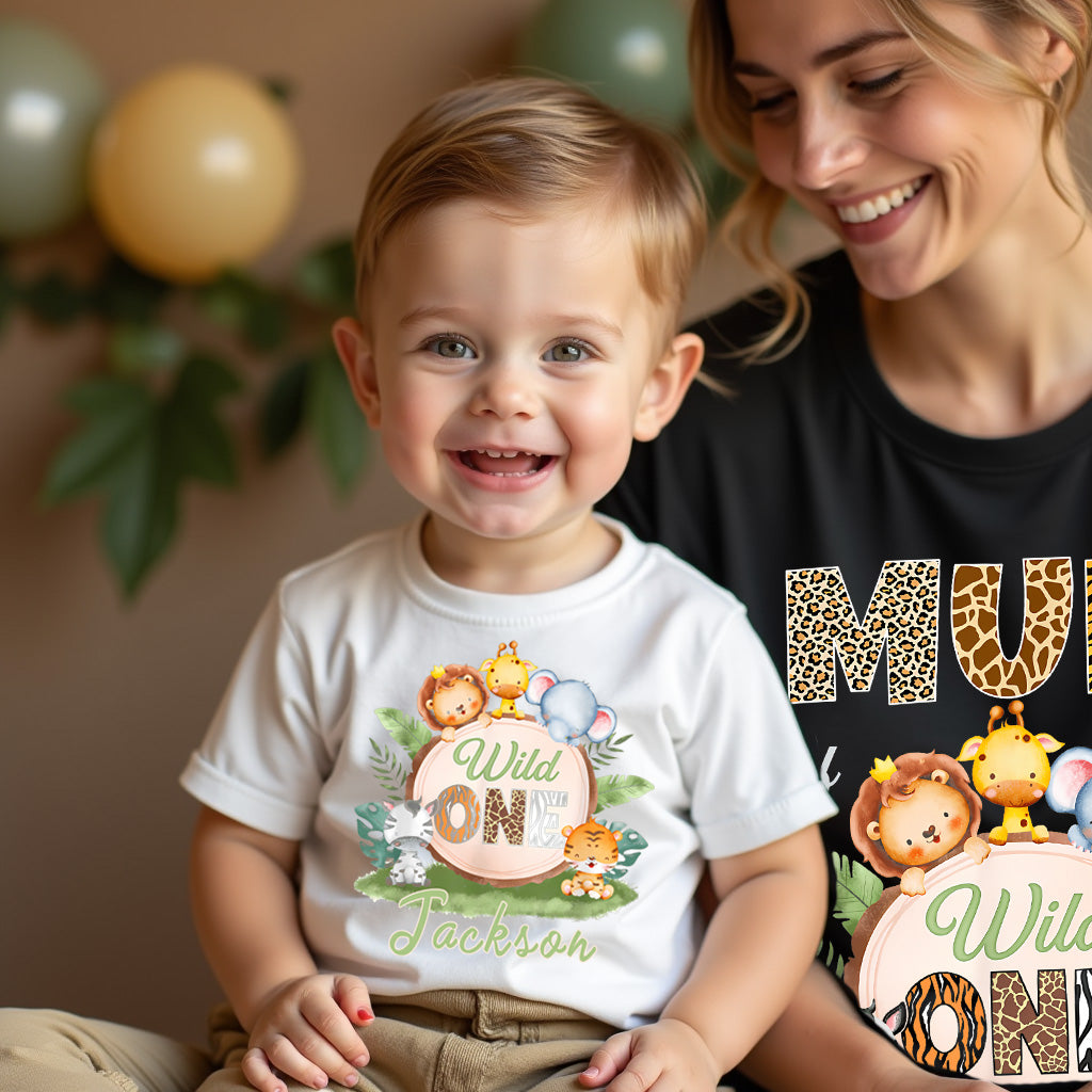 Woman and child wearing matching t-shirts with animal-themed designs and text.