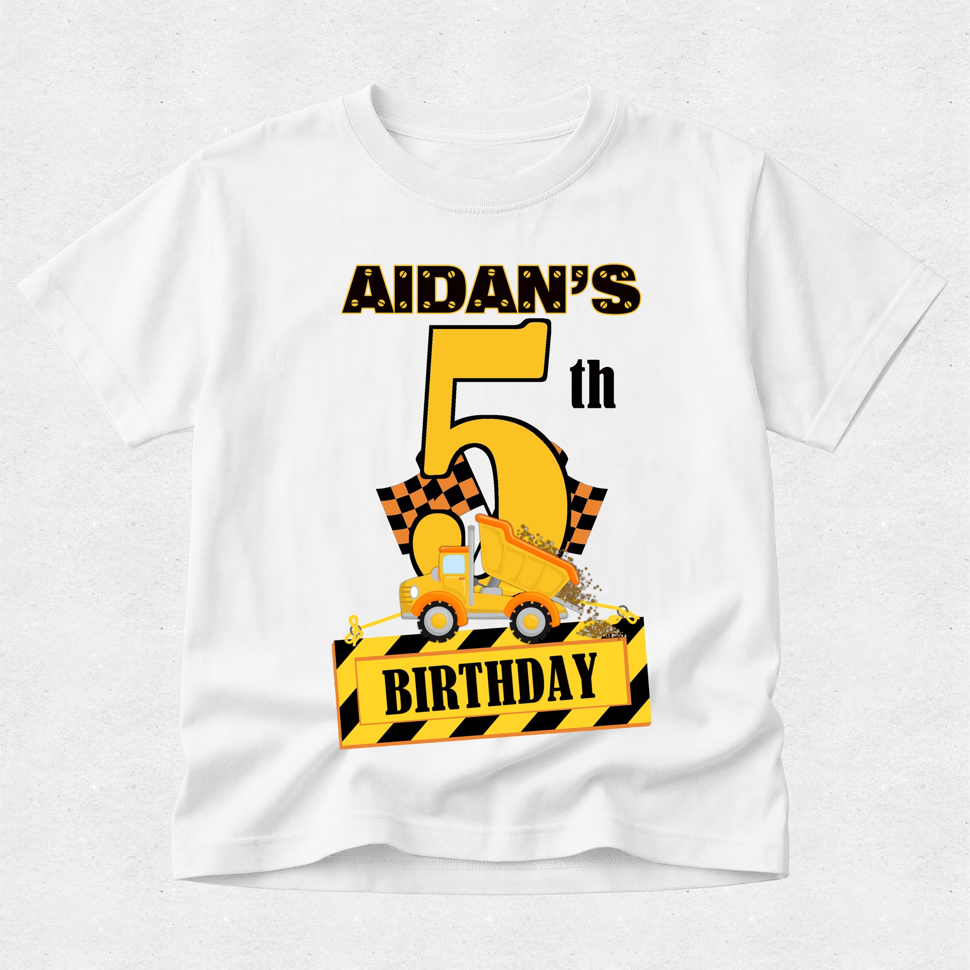 White t-shirt with a construction-themed birthday design on a white background