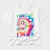 White t-shirt with colorful text and graphics on a white background