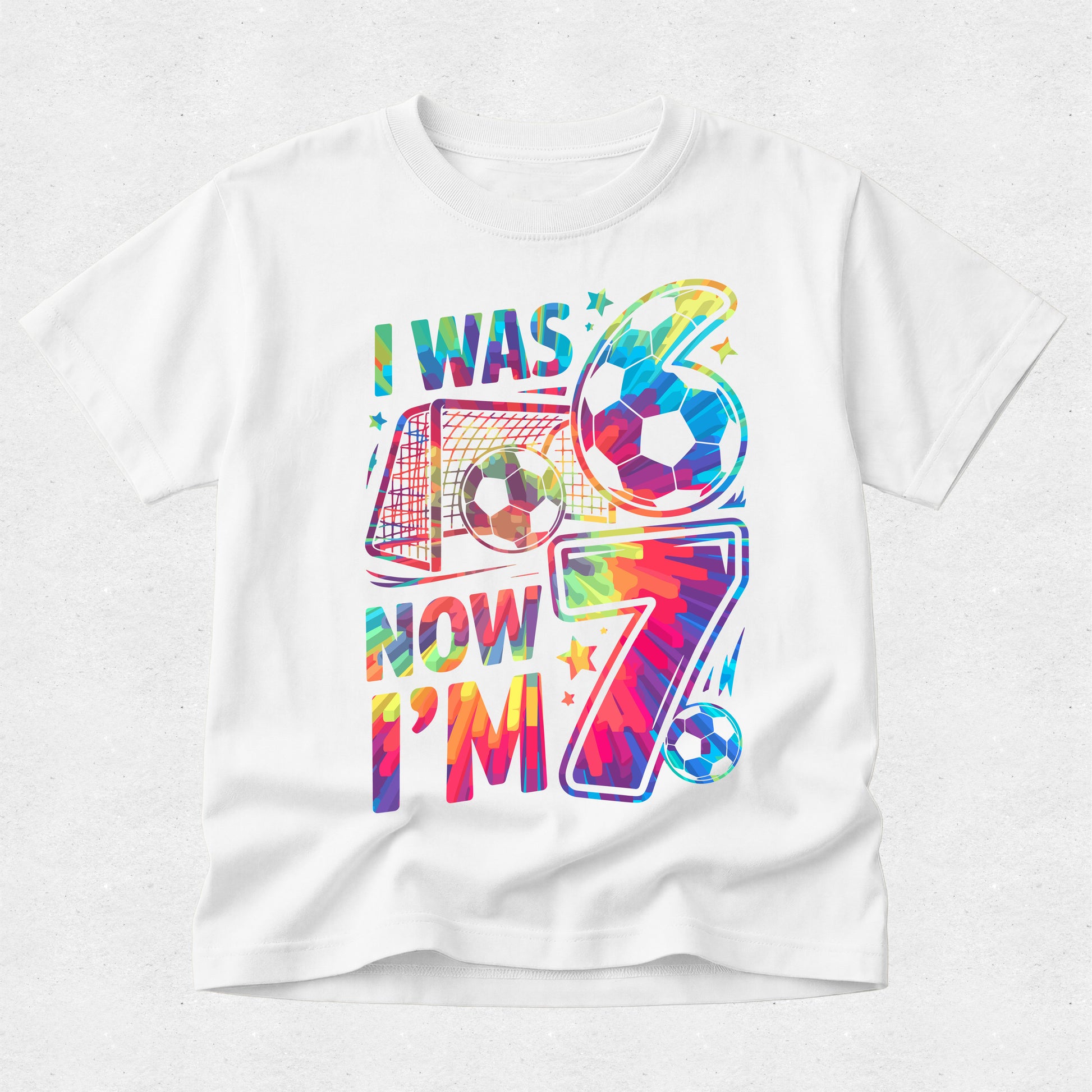 White t-shirt with colorful text and graphics on a white background