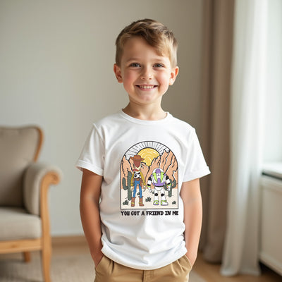 Child wearing a white t-shirt with a graphic design of characters from Toy Story, standing in a room.