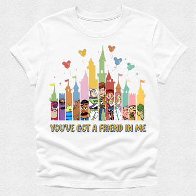 White t-shirt with colorful cartoon characters and castle design on a white background