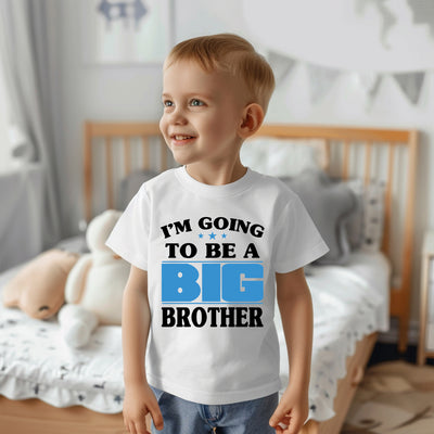 Young boy wearing “I'm Going to Be a Big Brother” shirt, perfect for family photos and baby news celebrations.