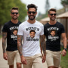 Three men wearing t-shirts with 'Steve's 30th Birthday Crew' text and a photo of a man on a blurred outdoor background.