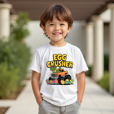 Child wearing a white t-shirt with 'Egg Crusher' graphic design outdoors.