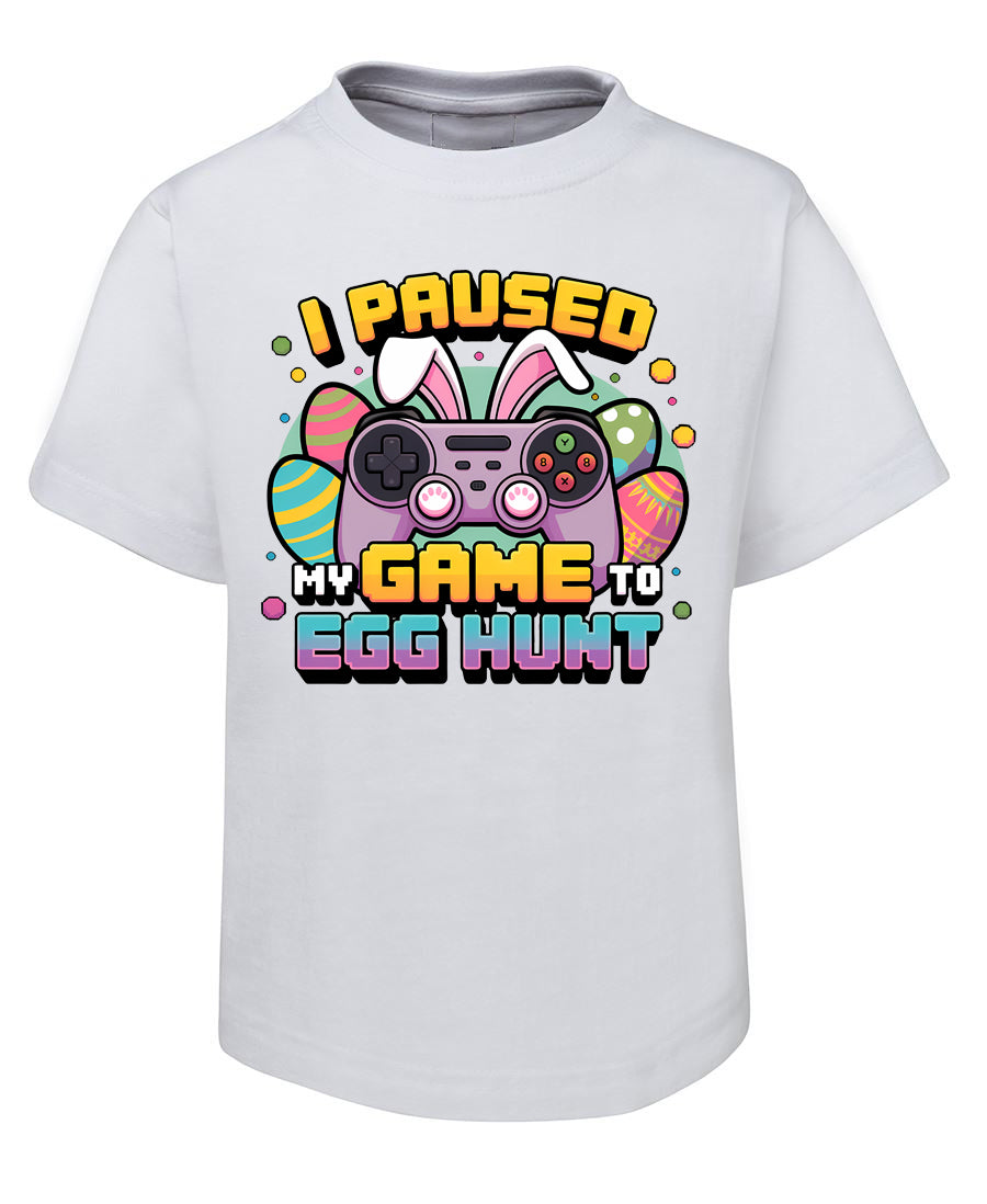 White t-shirt with Easter-themed graphic and text on a white background