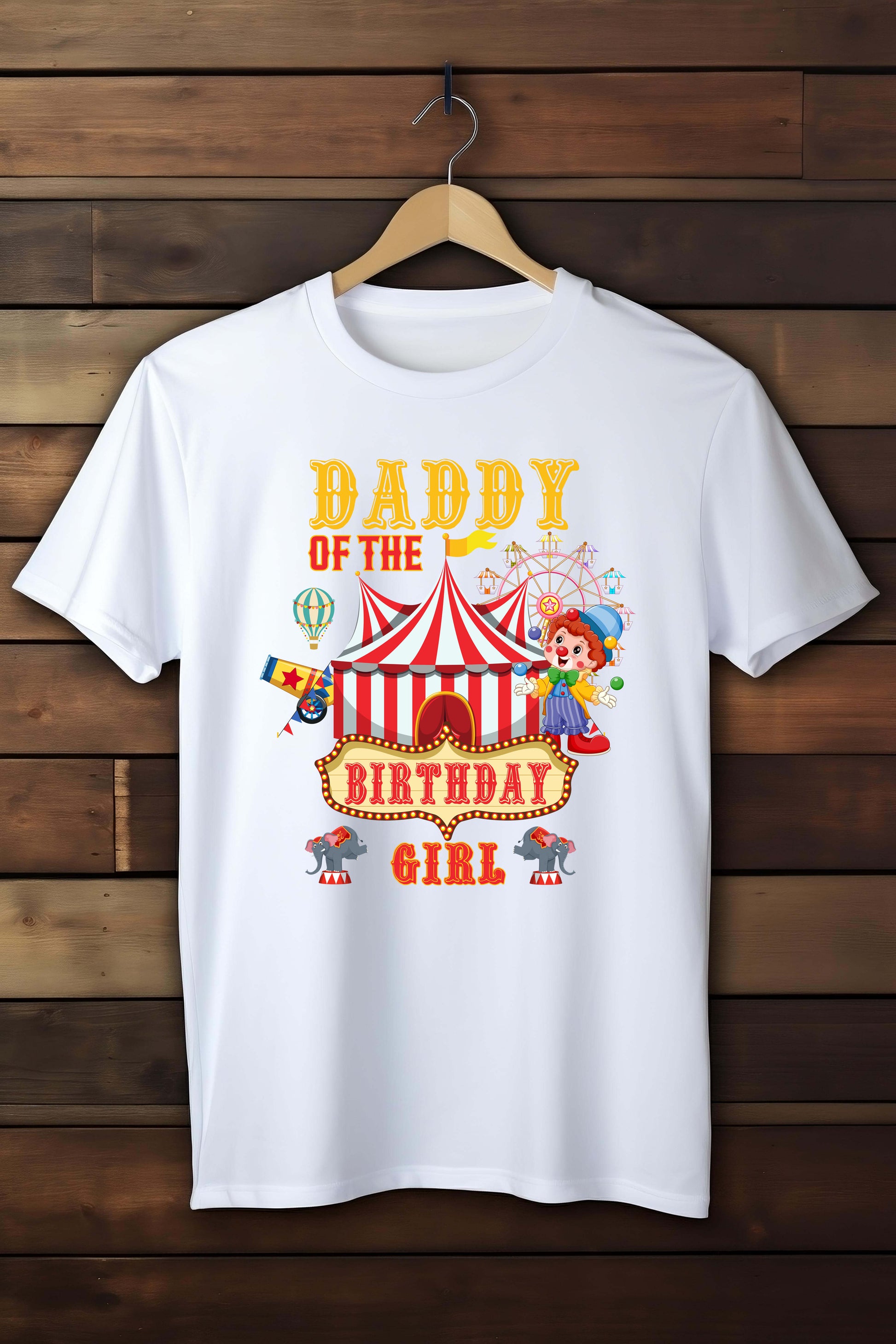 White t-shirt with colorful text and graphics on a wooden background