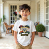 Boy wearing white personalised Monster Jam t-shirt with monster trucks design
