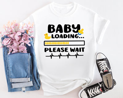 White maternity t-shirt with “Baby Loading” progress bar graphic, perfect for pregnancy reveal moments.